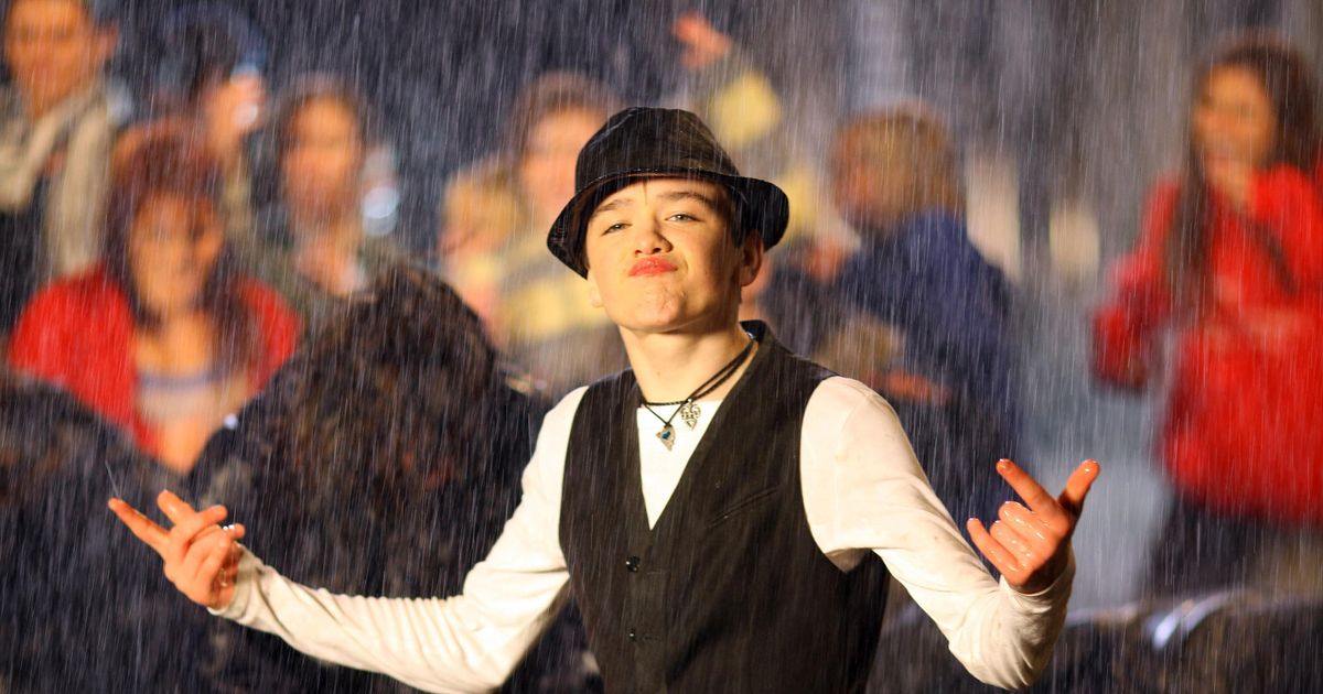 George Sampson Singing in the Rain