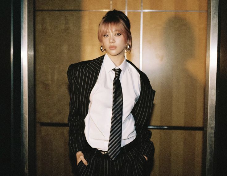 Megan in a Suit Katseye