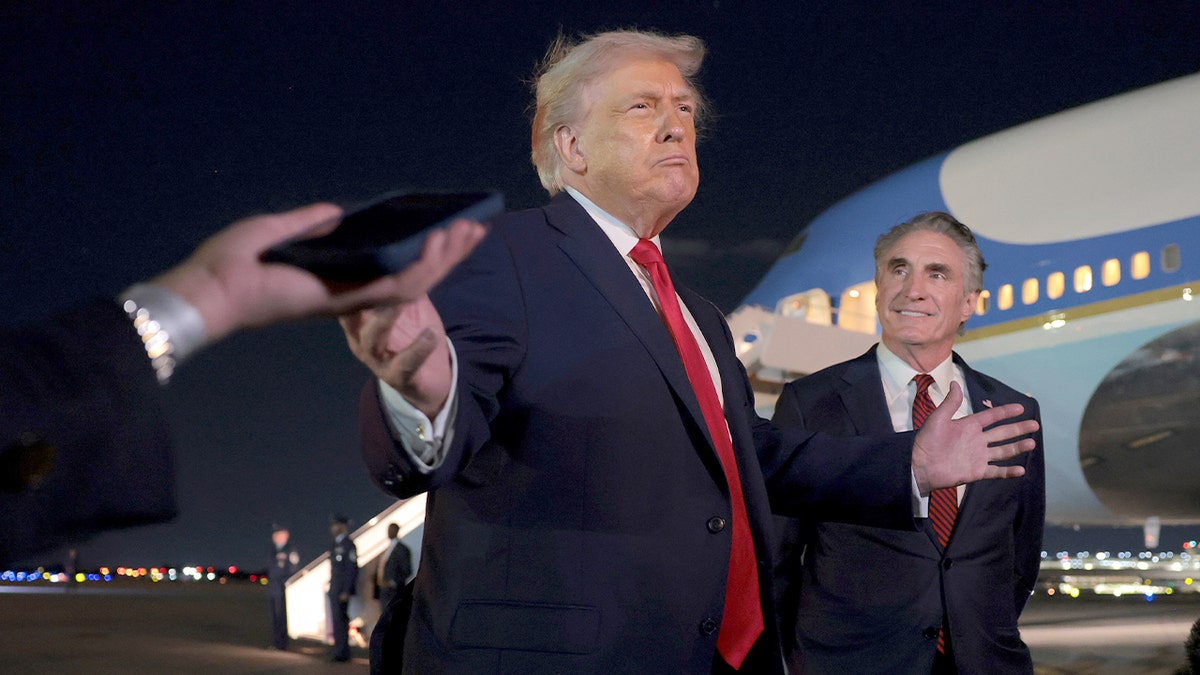Donald Trump Confronts Reporter on Tarmac After Question About $5,000 Checks