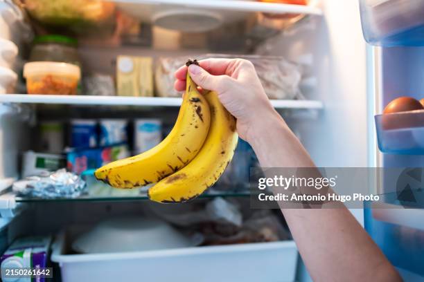 Putting Bananas in Fridge